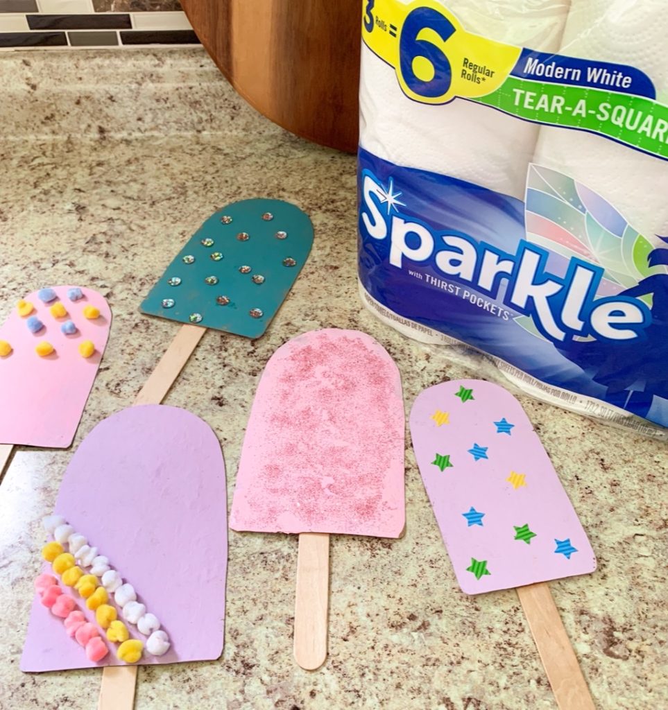 popsicle craft with sparkle tear a square paper towels